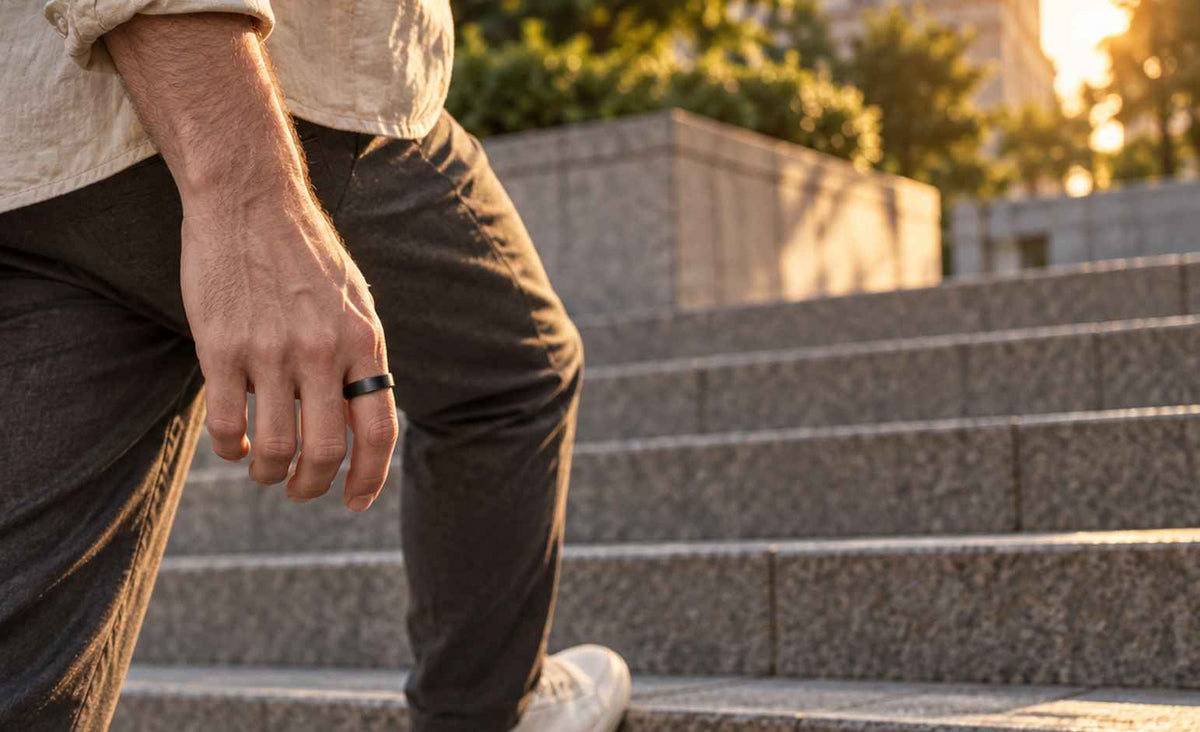 Man wearing GemRing while walking outdoors for daily activity tracking.
