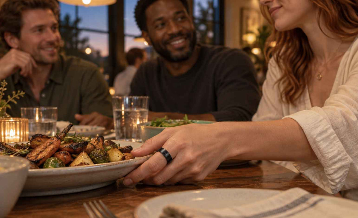 Woman wearing GemRing during dinner with friends.