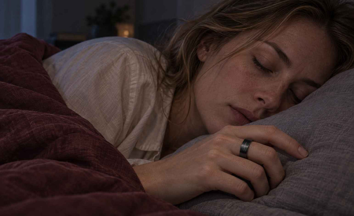 Woman wearing GemRing while sleeping for overnight sleep tracking.